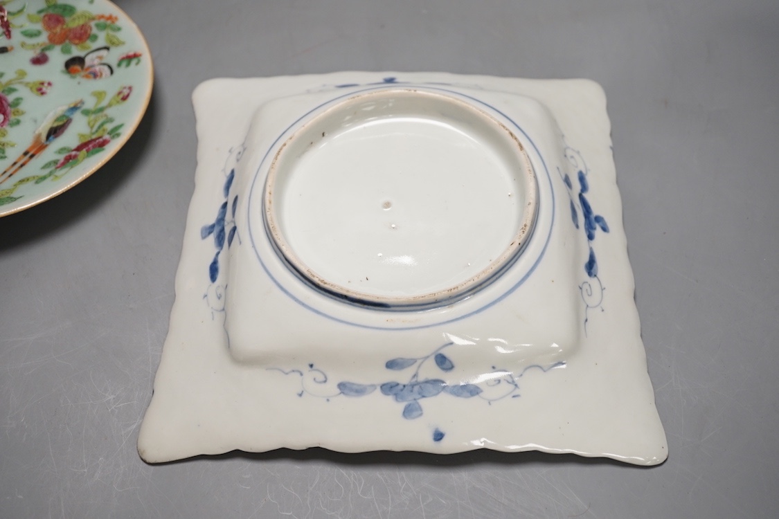 A 19th century Chinese blue and white 'prunus' vase, a Chinese green glazed jar, a japanese vase and two dishes and two Canton famille rose plates (7)